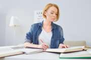 Concentrated woman learning information before exam