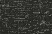 Blackboard inscribed with scientific formulas and calculations in physics and mathematics. Science and education background.