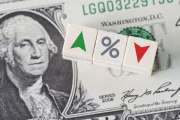 Concept idea of FED, federal reserve system is the central banking system of the united states of America and change interest rates. Percentage icon and arrow symbol on wooden cube
