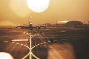 DUBAI, UAE - JAN 25, 2019: Airliners qued up to tax from Dubai airport (DXB) in sandy conditions during early morning.