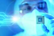 Close-up of Professional Scientist Holding a Modern Microprocessor Chip in his Hand. The Concept of Scientific Laboratory, Research and Development of Microelectronics and Processors. Manufacturing Worker uses Computer Technology and Equipment.