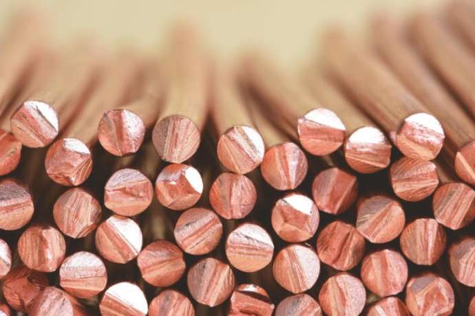 Electrical power cable close-up with selective focusCopper wire raw materials and metals industry and stock market concept