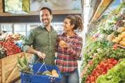 Shopping fresh groceries in modern supermarket in Latin America