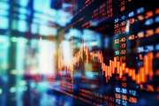 Close-up of a digital screen displaying financial stock market data with graphs and analytics, illustrating market trends and investment analysis.