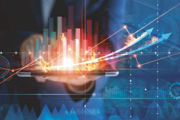 Hot business growth. Businessman using tablet analyzing sales data and economic growth graph chart. Business strategy, financial and banking. Digital marketing.