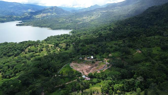 A landscape with a lake and mountains