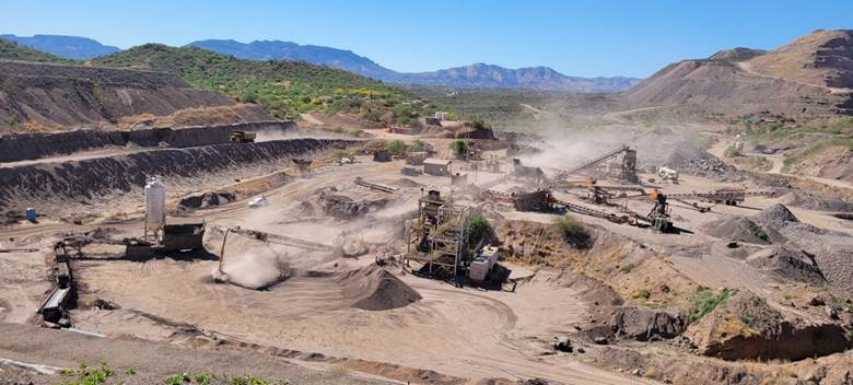 A dirt field with dirt and dirt piles
AI-generated content may be incorrect.